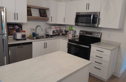 Dieppe Apartment | Modern Oasis | 2BR Downtown Retreat w/Balcony & Free Parking