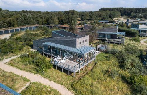 Ouddorp Villa | Modern Panorama Villa - 4p - Glazen Serre, Waterzicht & Comfort - Villa 36