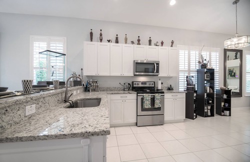 Saturnia Lakes House | Modern single family home in Resort Style Community