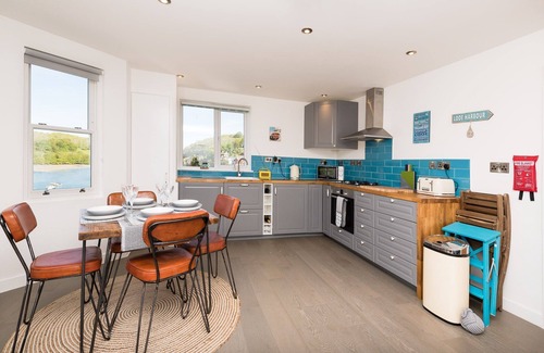 Looe House | Modern town centre apartment with balcony and river views.