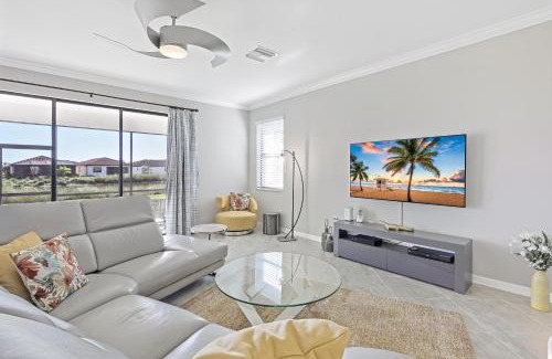 Naples House | Modern waterfront home in Artesia with pool/gym