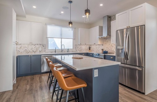 Silver Star Mountain House | Modern Whole Duplex - Sleeps 24! Both sides, 2 hot tubs, garages, ski in/out!