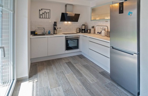 Westeraccumersiel Apartment | Moderne Erdgeschoßwohnung Küstenkäthe mit Sauna