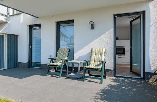 Ibbenbueren Apartment | Modernes Apartment mit Terrasse & Garten, Parkplatz & Self-Check-in