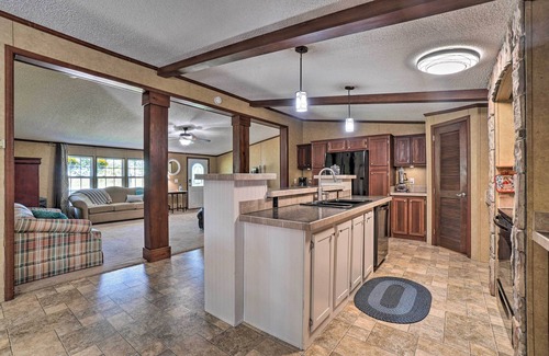 Powell House | Monett Family Ranch Home w/Fireplace & Huge Deck!