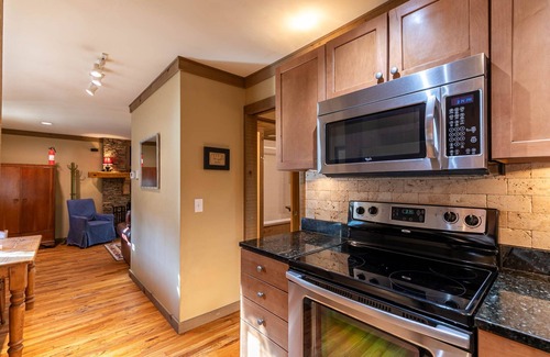 Boone House | Monkey Business - Romantic getaway cabin with Hot Tub & Koi Pond