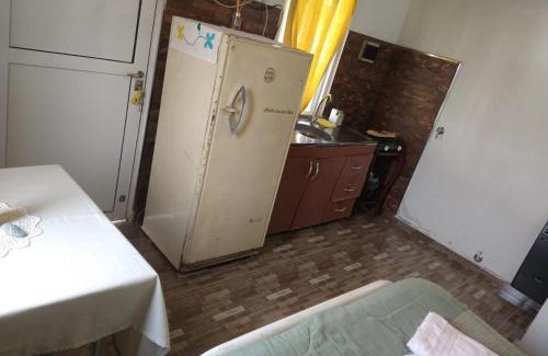 Mesopotamia Apartment | Monoambiente con baño privado, cocina, heladera y cochera en Pueblo Belgrano
