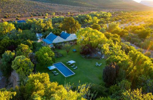 Blue Crane Route Cabin | Mount Camdeboo Private Game Reserve by NEWMARK