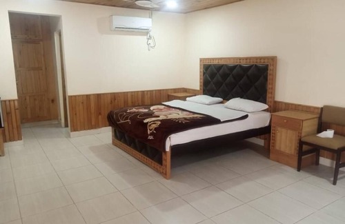 Chitral Hotel | Mountain Inn Hotel Chitral