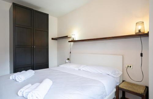 Barzio Apartment | Mountain lodging with fireplace and mountain view