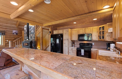 Divide Cabin | Mountain & Pond Views, Hot Tub, Movie Theater