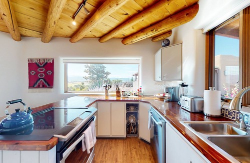 Taos House | Mountain-view estate with casita, POP tennis, rooftop bar & private hot tub