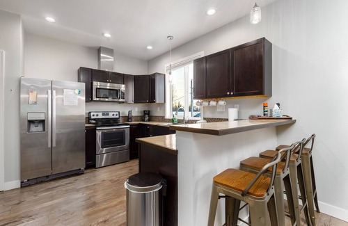 Eagle River Apartment | Mountain-view stay in a great location with a private balcony, & washer/dryer