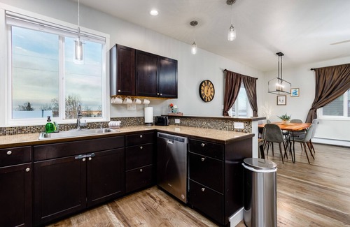 Eagle River Apartment | Mountain-view stay in a great location with a private balcony, & washer/dryer