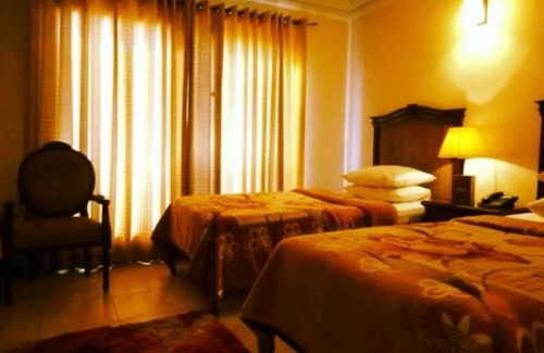 Gulshan-e-Iqbal Hotel | Mulberry inn Guest House Karachi