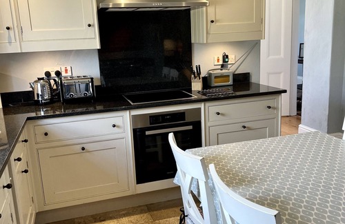 Newport House | Multi-award winning Georgian Farmhouse, village location, short walk to beach