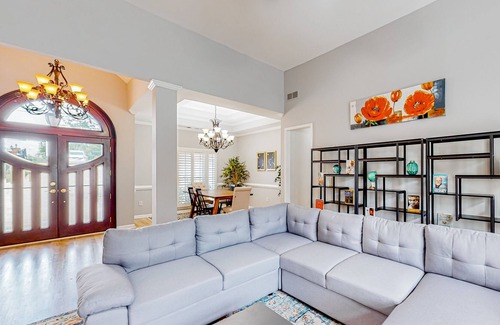 East Point House | Multi-level home with an in-home theater, fireplace, & enclosed yard - dogs ok