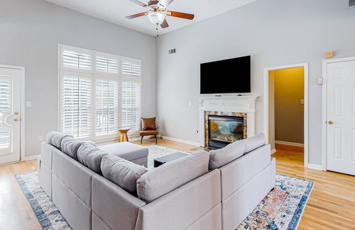 East Point House | Multi-level home with an in-home theater, fireplace, & enclosed yard - dogs ok