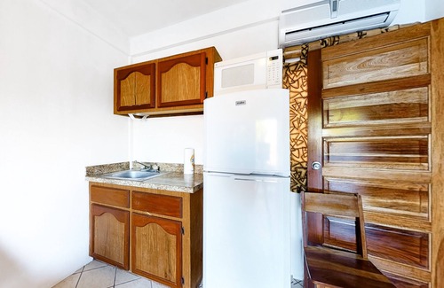 Caye Caulker House | Multi-Suite Family Property with Private Pool, Ocean Views, WiFi, and Partial AC