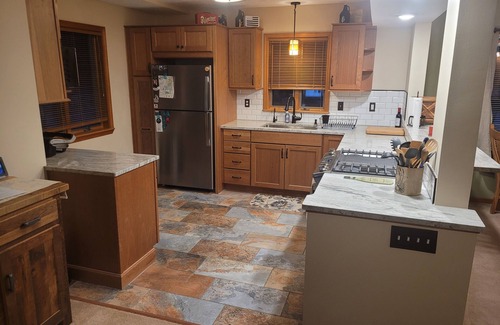 Mayfield House | Multi-week rental directly on Chandler Lake deck, fire pit, tandem kayak.