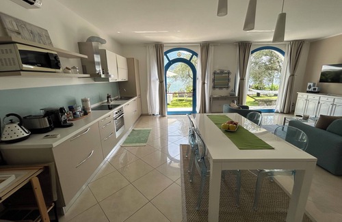 Peschiera Maraglio Apartment | MY HOME IN MOUNT ISLAND-Apartment facing Lake Peschiera Maraglio