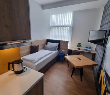 Hallbergmoos Hotel | my MINGA Airport serviced Apartments