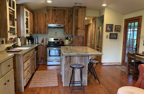 Breaux Bridge Cabin | "My Playhouse" Enjoy the country views from the wrap around screened porch