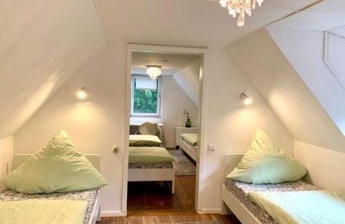 Melsungen House | Nature Living - Ferienhaus mit Kamin - Feuerschale - Garten - mit beheizbarem Gartenwhirlpool