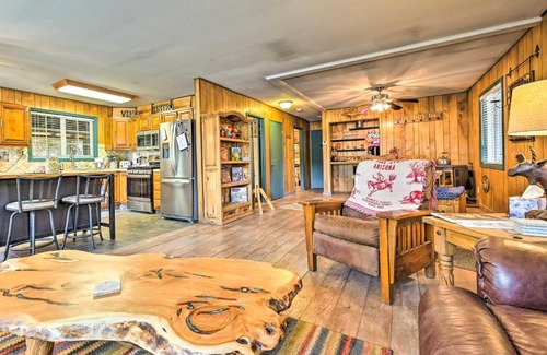 Strawberry House | Near Hiking Trails Woodsy Pine Cabin with Fire Pit