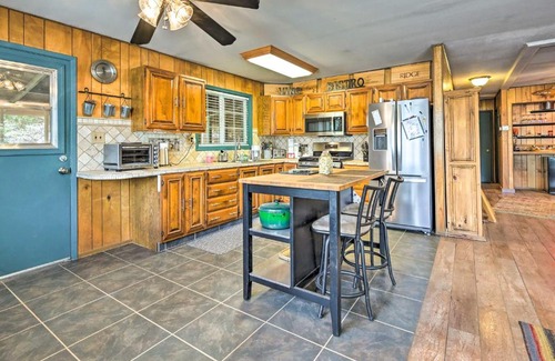 Strawberry House | Near Hiking Trails Woodsy Pine Cabin with Fire Pit