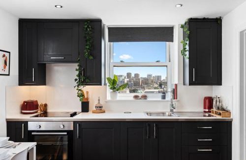Brighton City Centre Apartment | Neon on the Lanes