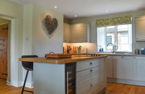 Cattistock Cottage | Nestled amidst the tranquil countryside, this charming holiday cottage offers breath taking rural vi