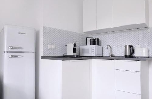 Mitte Apartment | nestup - Zentrales Apartment mit Boxspringbetten, Smart-TV und ausgestatteter Küche