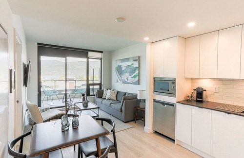 Cultural District Condo | NEW 2-bedroom condo in Downtown Kelowna with LAKE views & 25th FL access