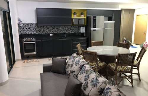 Praia Grande Apartment | New apartment high standard modern sea front building, terrace, beautiful pool.