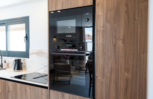 Palm-Mar Villa | NEW Designer Villa Heated Pool & Sunset Rooftop AC