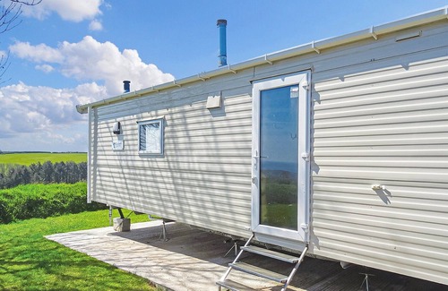 Looe House | New in 2017, 2018 and 2019. 12ft-wide superior caravan with one double and two twin.