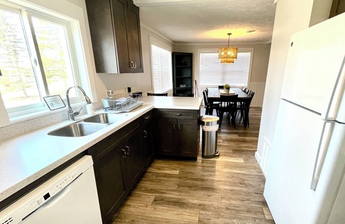 Traverse City Cottage | New Listing! 3br cottage on Lake Leelanau with beach, boat launch, playground!