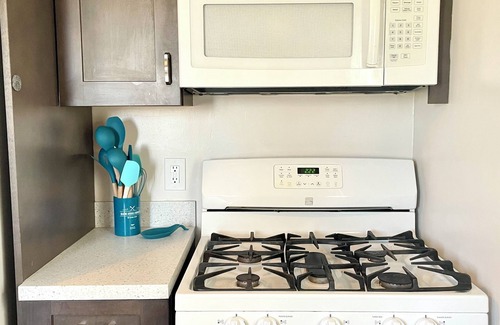 Traverse City Cottage | New Listing! 3br cottage on Lake Leelanau with beach, boat launch, playground!