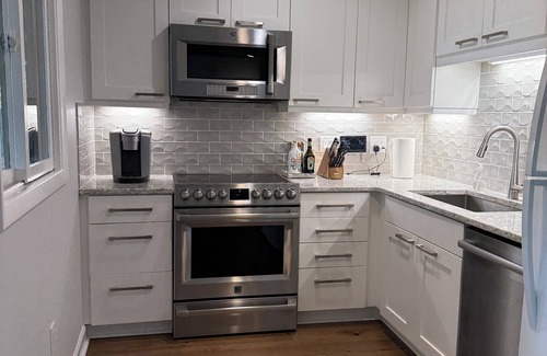 West Beach Cottage | New Listing Charming cottage on lagoon with distant beach view-near Cougar Point