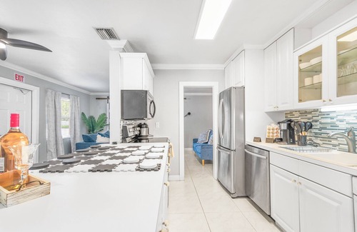 Tarpon River House | New Luxury: Mins to beach GIANT games Entire Home & King Suite Coffee, Ac, WiFi!