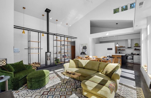 Portage House | New Modern Cabin, Hot Tub & Kayaks on WI River near Devil’s Lake & WI Dells