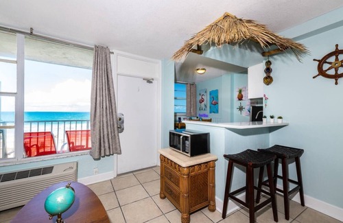 East Daytona Apartment | NEW POOL OPEN! Direct Oceanfront | Remodeled Tiki Theme | Private Balcony