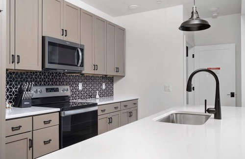 Traverse City Condo | NEW Slabtown Suites 301