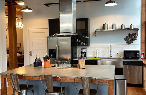 Rochester Apartment | NEW TO VRBO: Industrial History with a Modern Day Design Loft Apartment