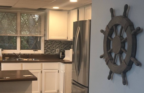 Alger House | NEW to VRBO! Large Lakefront Home. Relaxing. Stunning Views. Family Fun.