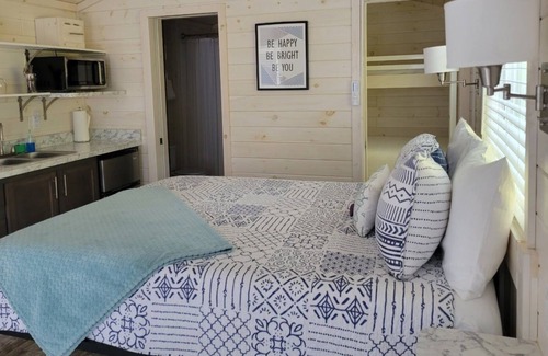 Steele Creek House | New Waterfront Cabin On The Large Sundeck 1 Bedroom Cabin by Redawning