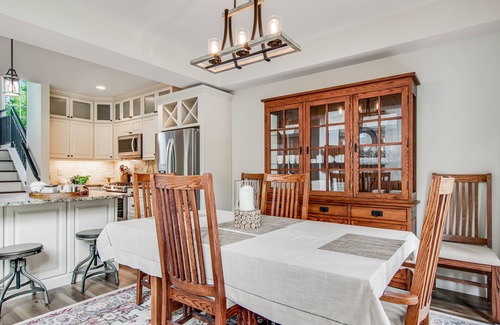 Eagle River Condo | Newly-built condo on Duck Lake with decks, private dock, & firepit