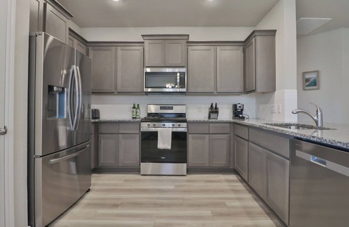 Wellborn House | Newly built home in south College Station with comfortable beds and free WiFi!