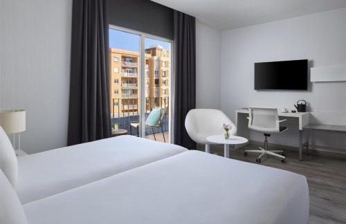 La Maternitat i Sant Ramon Hotel | NH Barcelona Stadium